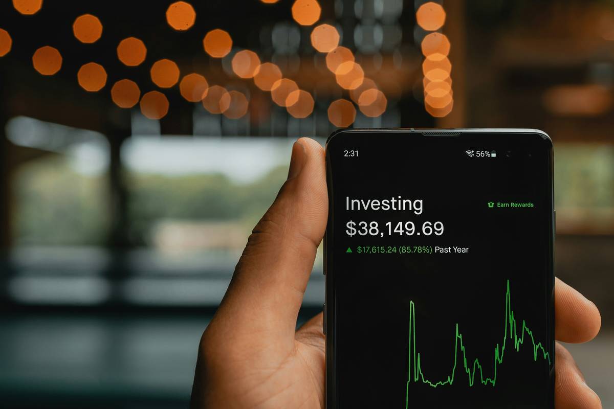 how to reinvest dividends illustrated as a growing tree diagram with labeled branches showing automatic DRIP, manual buy orders, and tax-efficient allocation across accounts